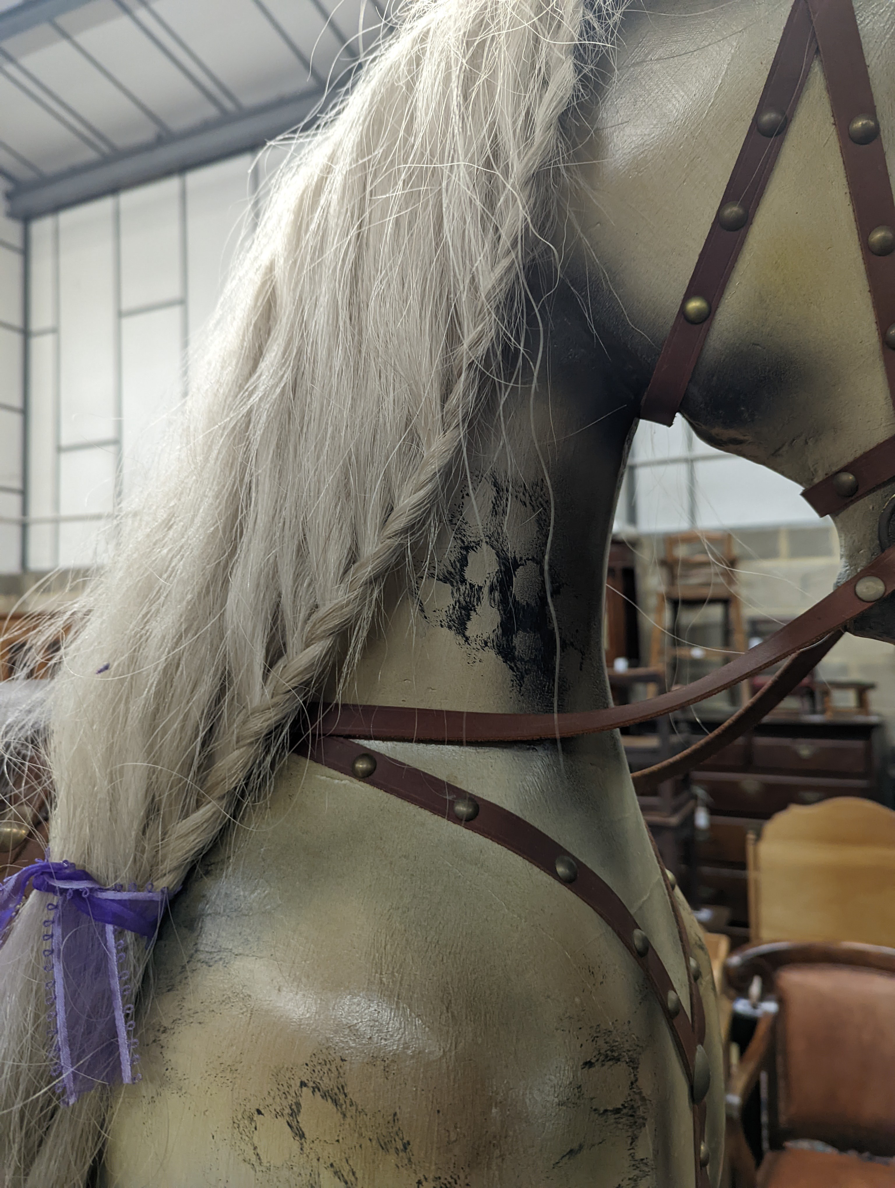 A large Victorian style painted rocking horse with end seats, length 240cm, height 132cm